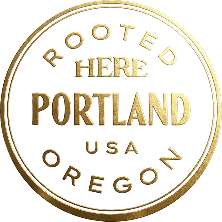 The gold-foil Champion Badge: Rooted HERE, Portland, Oregon, USA